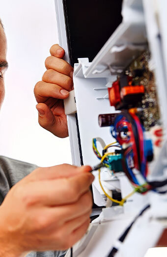 /uploads/2025/04/electrician-connecting-switchboard-power.jpg
